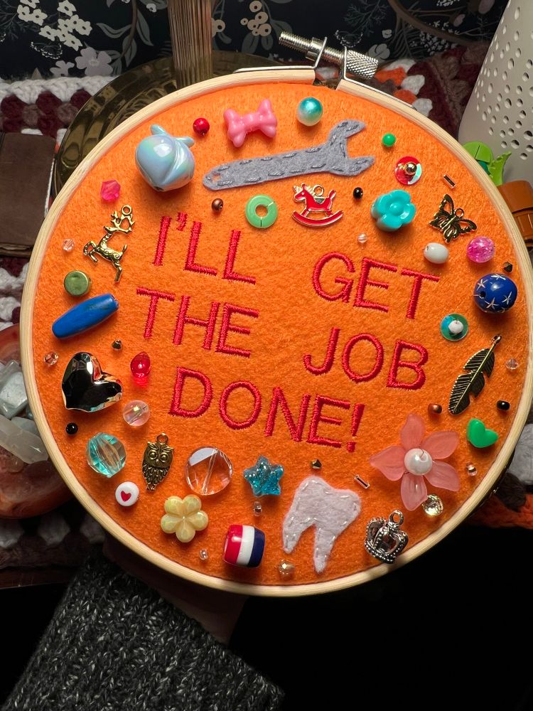 chaotic charm embroidery with lyrics from chappell roan’s song “the giver”: “i’ll get the job done!”