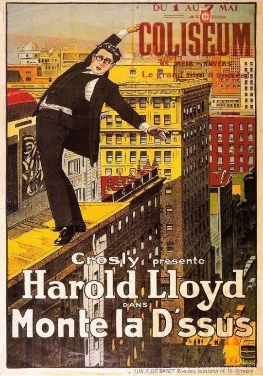 Poster features a painting of Harold Lloyd teetering precariously on the ledge of a tall building.