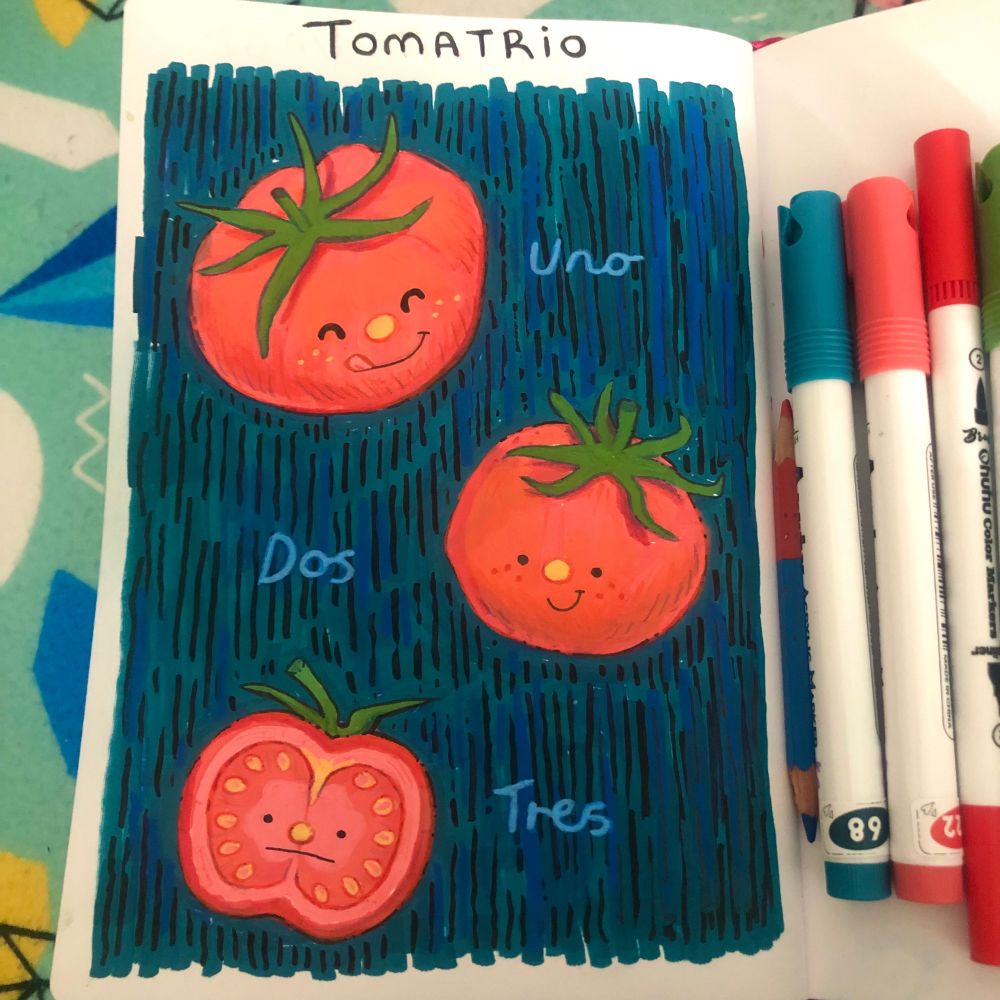 A photo of an open sketchbook page, there are three red tomatoes with little faces illustrated on each one. The one at the bottom is cut in half and has an unimpressed expression :|