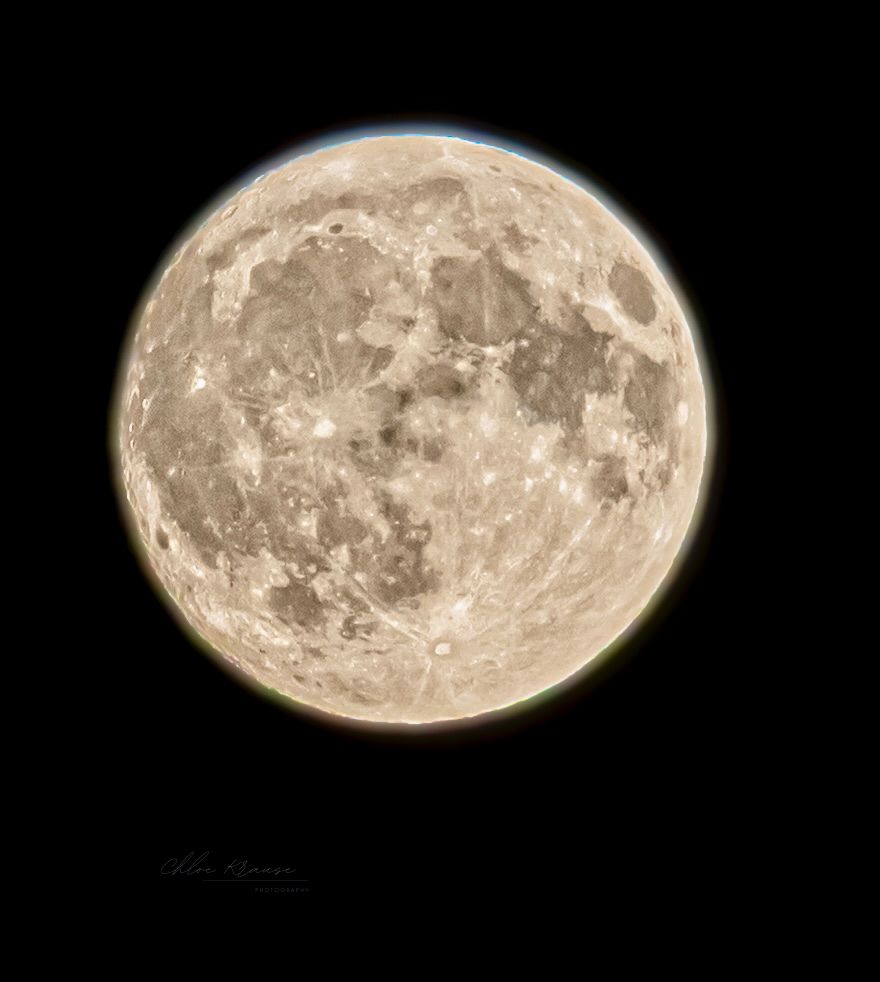photo taken on a telephoto lens of the very nearly full moon. 