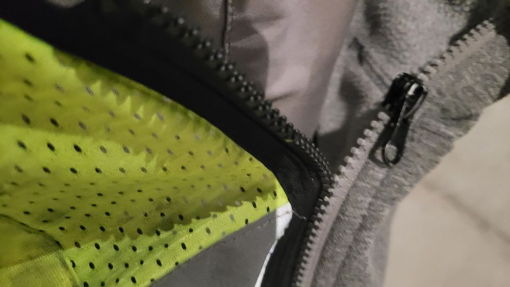 My hoodie zipped to my high vis vest