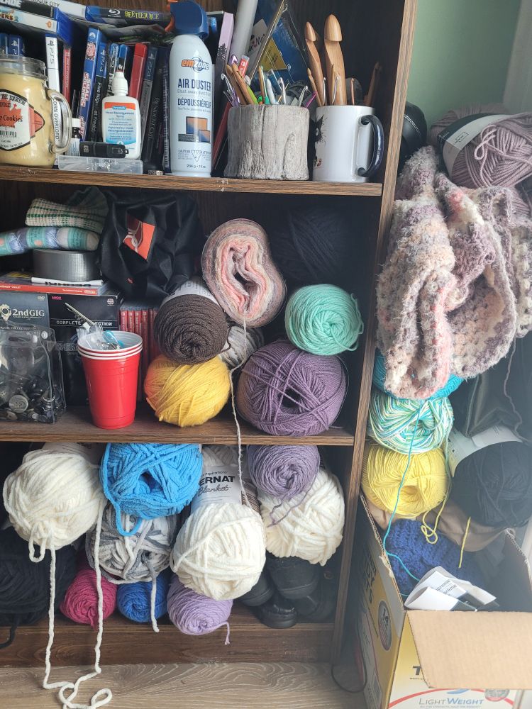 This is the shelf to my left that has some of my stash so I can crochet on the couch while being with the family 