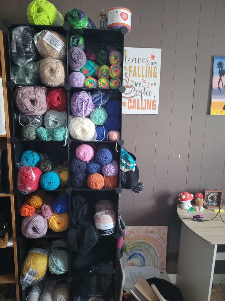 This is about 10 cube shelves of various yarn balls in my upstairs office 