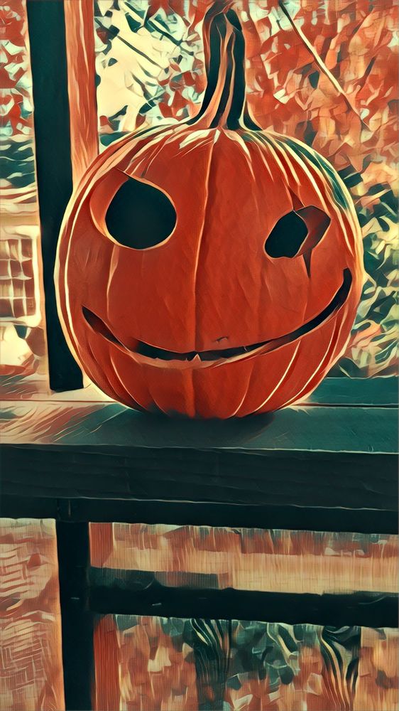 A pumpkin that I carved into a jack o'lantern then photographed then fed photo through a stylistic filter 