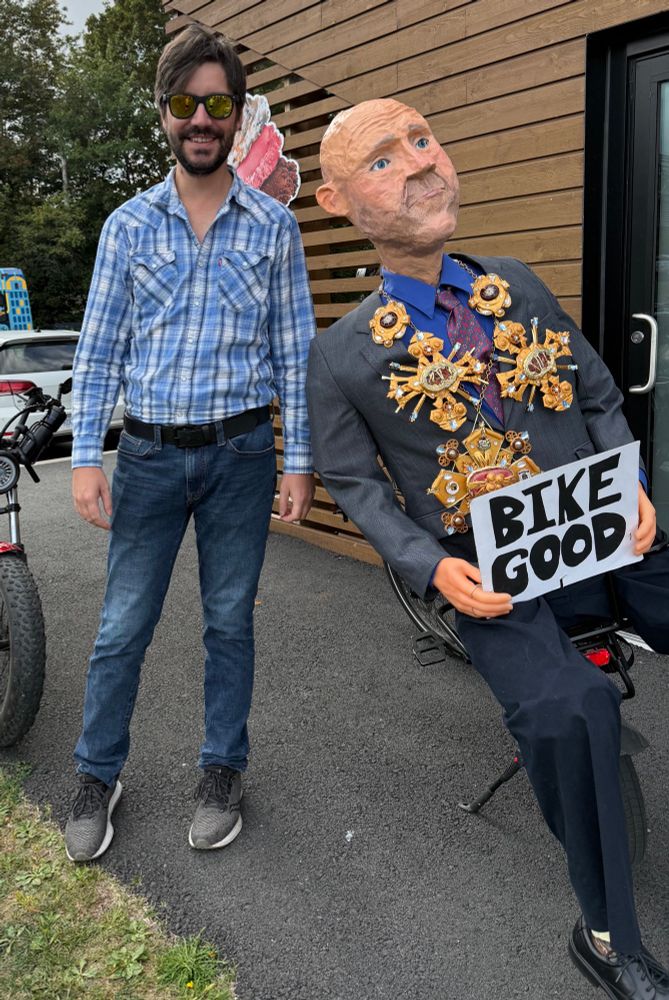 Andy Fillmore in effigy rides on the back of our Bike Mayor’s bike