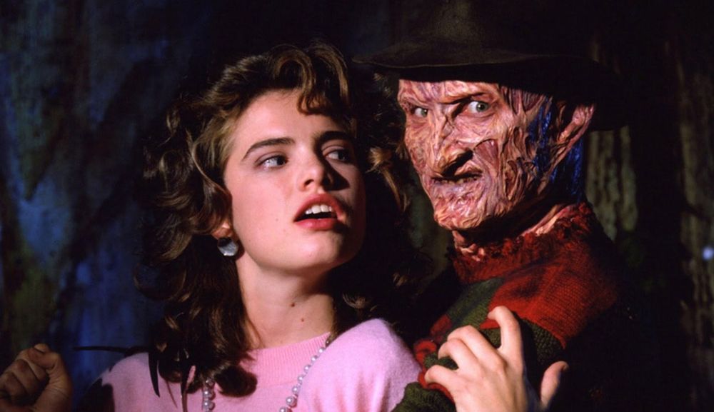 still of Heather Langenkamp as Nancy Thompson and Robert Englund as Freddie Kruger and from Nightmare on Elm Street 3: Dream Warriors, I am borrowing a meme template from Jesse Hawkins  