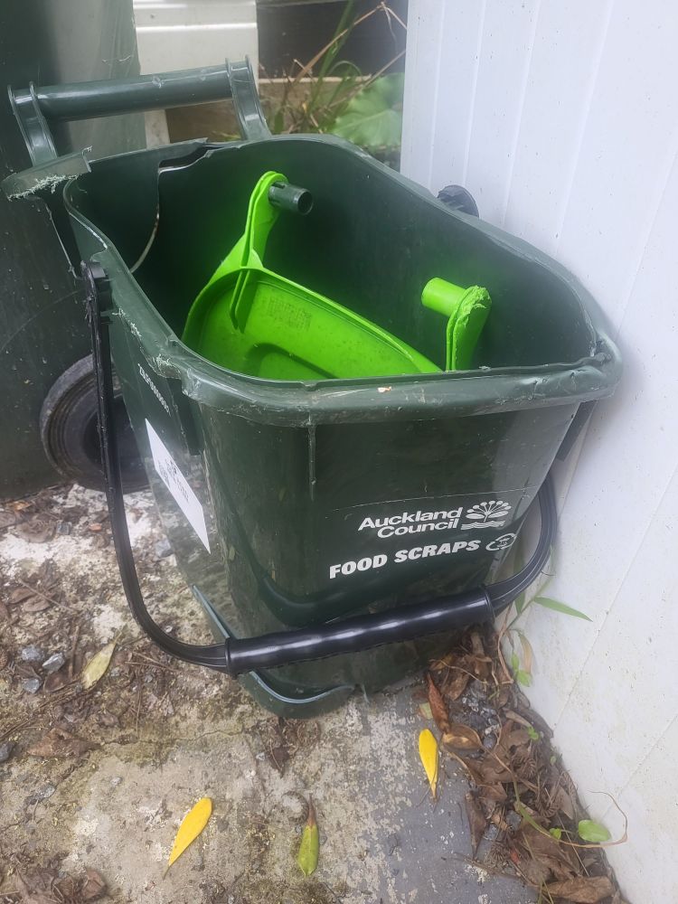 A food scraps bin, fondly known as little binny, squashed by a motorist. RIP buddy