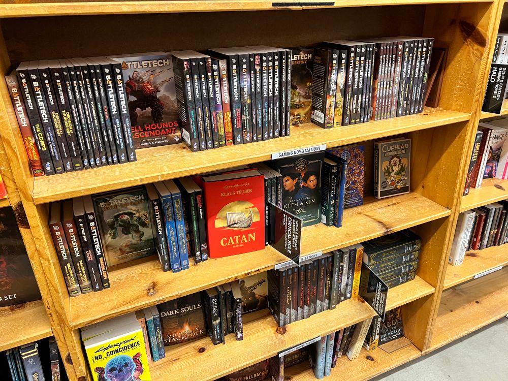 A shelf full of BattleTech books
