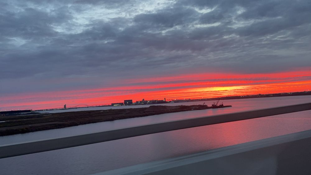 a beautiful sunrise over a lake 