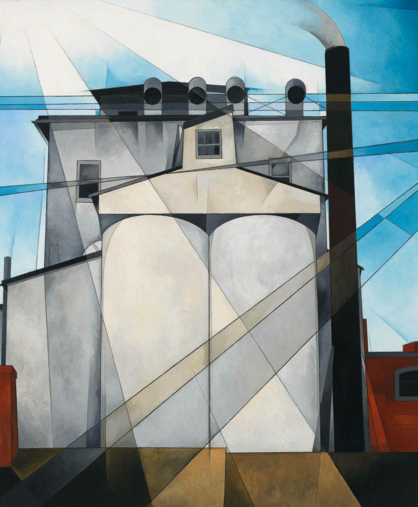 image from https://whitney.org/collection/works/635:
My Egypt depicts a steel and concrete grain elevator belonging to John W. Eshelman & Sons in Charles Demuth’s hometown of Lancaster, Pennsylvania. Painted from a low vantage point, the structure assumes a monumentality emphasized by the inclusion of the lower rooftops of neighboring buildings ... at the bottom of the painting. In Demuth’s image, the majestic grain elevator rises up as the pinnacle of American achievement—a modern day equivalent to the monuments of ancient Egypt. A series of intersecting diagonal planes add geometric dynamism add a heavenly radiance to the composition, invoking the correlations between industry and religion that were widespread in the 1920s. ...'
http://archive.org/details/charlesdemuthbar2402hask:
'Demuth's title exploited the Egyptomania that followed Howard Carter's discovery of Tutankhamen's tomb in 1922.'
