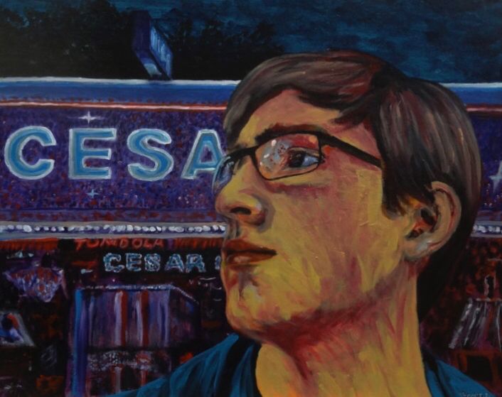 Portrait à l’acrylique de Lucas L, posant devant un stand de la foire à Rouen. 
