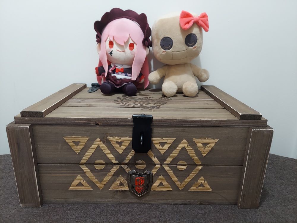 Porcelain plushie and blockhead plushie showing off the crate!