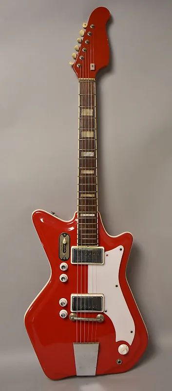 Here's probably the most famous guitar Airline ever made, the Res-O-Glas. The angular fiberglass body was molded in two pieces. It's got two single-coil pickups, and each one has its own volume and tone control. Those controls are located above the strings, next to the 3-way blade switch. There's also a master volume control below the strings, next to the output jack.

Eastwood owns the Airline name now.