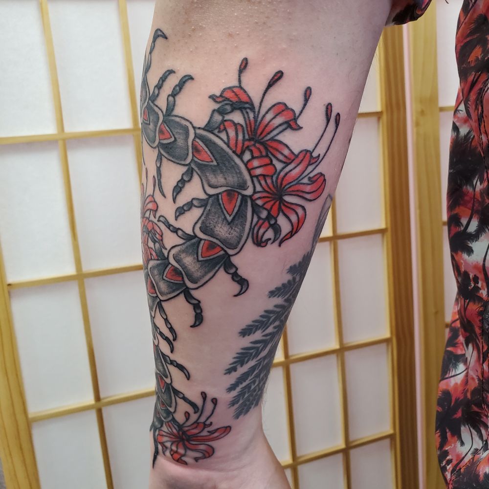 A shot showing some of the flowers wrapping to the underside of the forearm