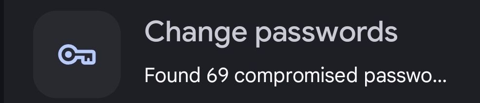 An image of a key next to the words "Change passwords". Under that, in smaller letters, it says "Found 69 compromised passwo..." 