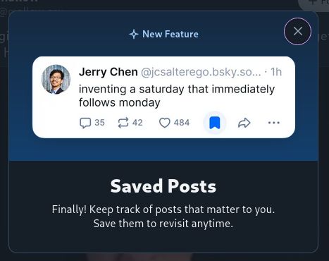 Screenshot of a Bluesky popup announcing saved posts (bookmarks).
The preview depicts a post that has been bookmarked, and below it reads:
"Saved Posts - Finally! Keep track of posts that matter to you. Save them to revisit anytime."