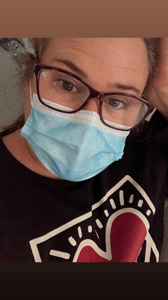 Julia wearing glasses and mask