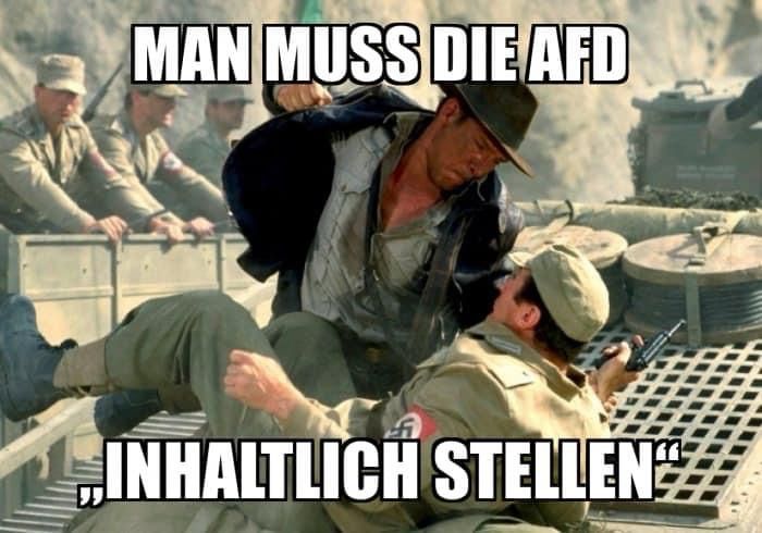 Indiana Jones haut einem Nazi, der eine Pistole in der rechten Hand hält, mit der Faust in die Fresse. Meme-Text dazu: Man muss die AfD „inhaltlich stellen“