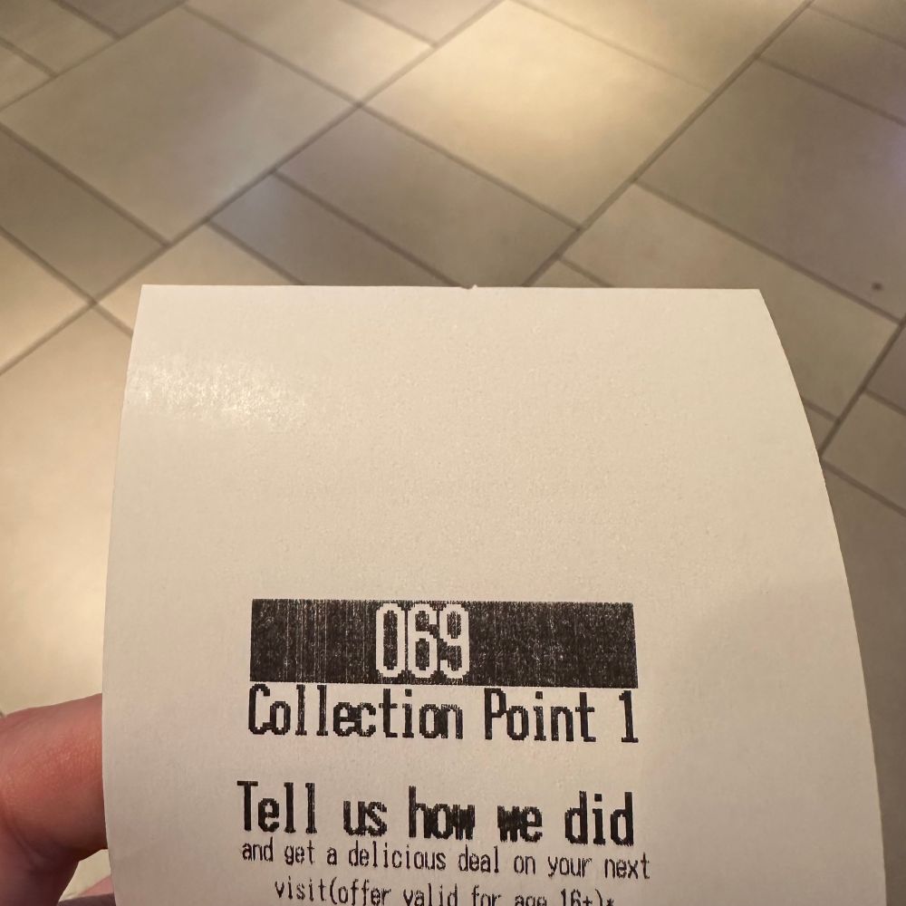 A McDonald’s receipt with the order number 069.