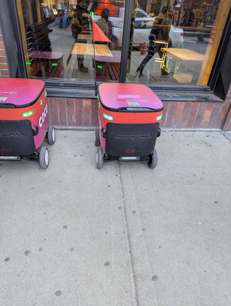 2 coco delivery bots, waiting. 