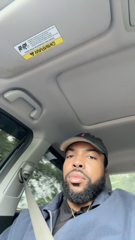 Me in black polo cap, blue jacket, black shirt and gold chain. 