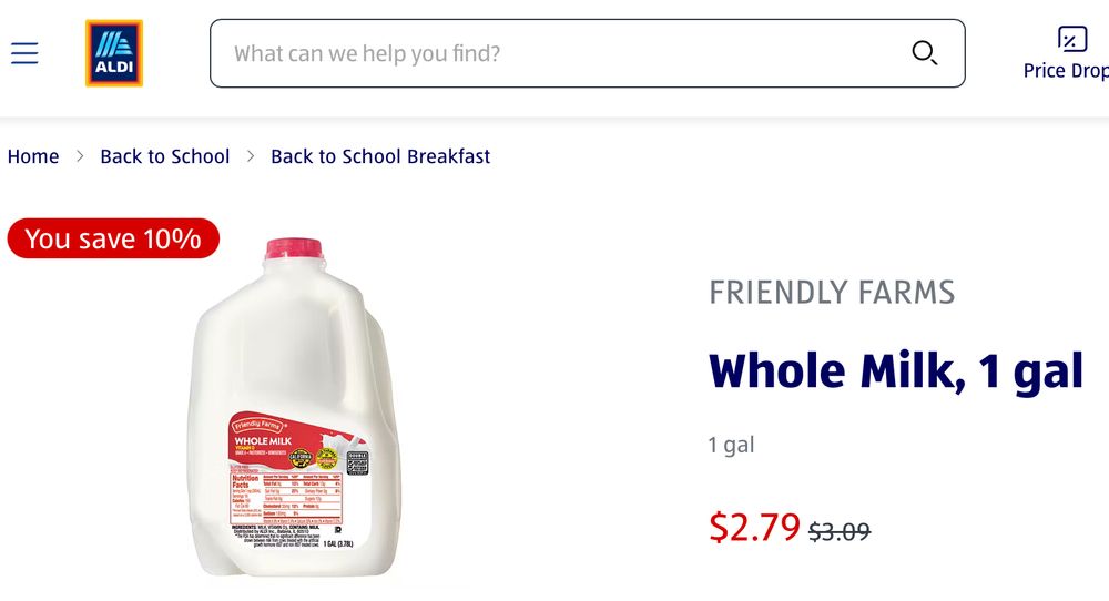 A grocery store selling milk for $2.79.