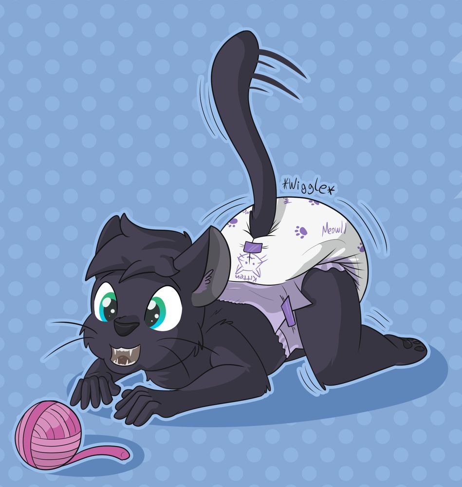 An anthro kitten getting ready to pounce in a yarn ball