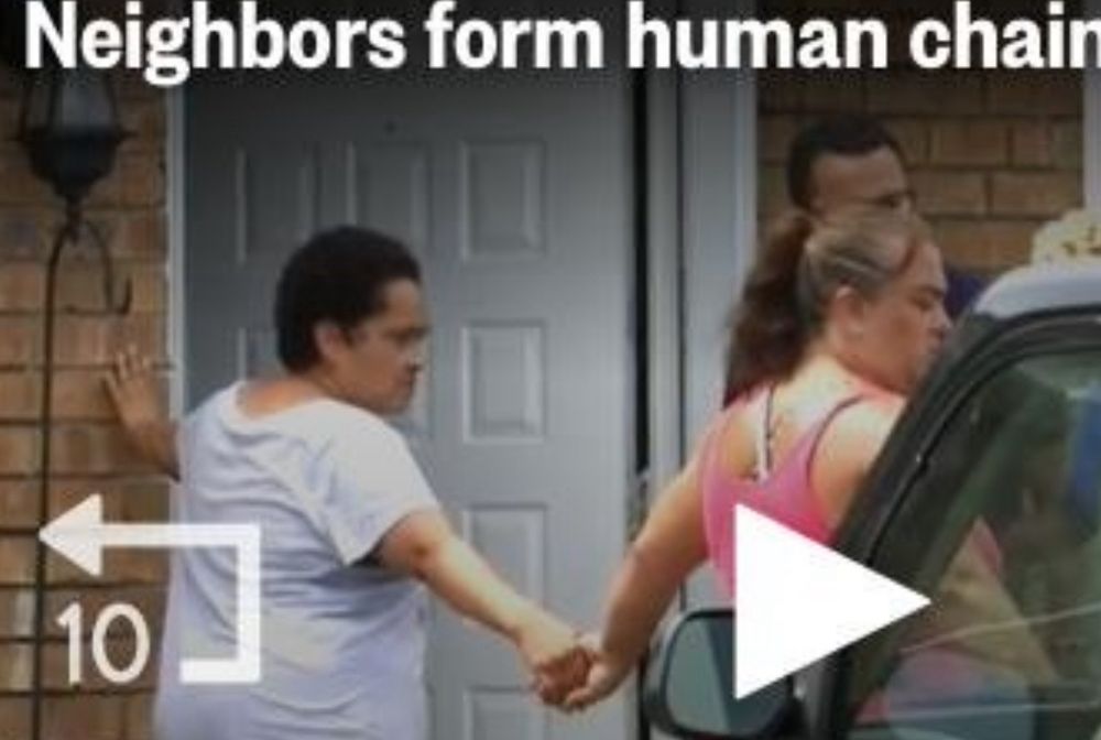 closeup screenshot of two tennessee women protecting their neighbor from ICE by forming a human chain with others who are not pictured 