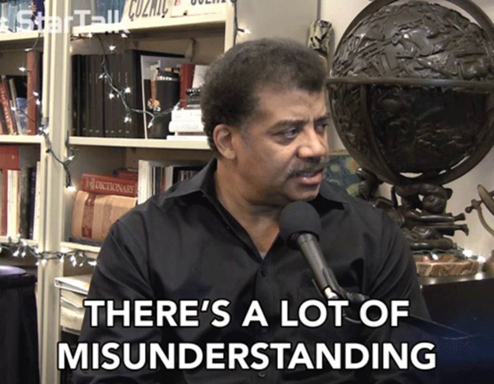 a man says there 's a lot of misunderstanding in front of a globe