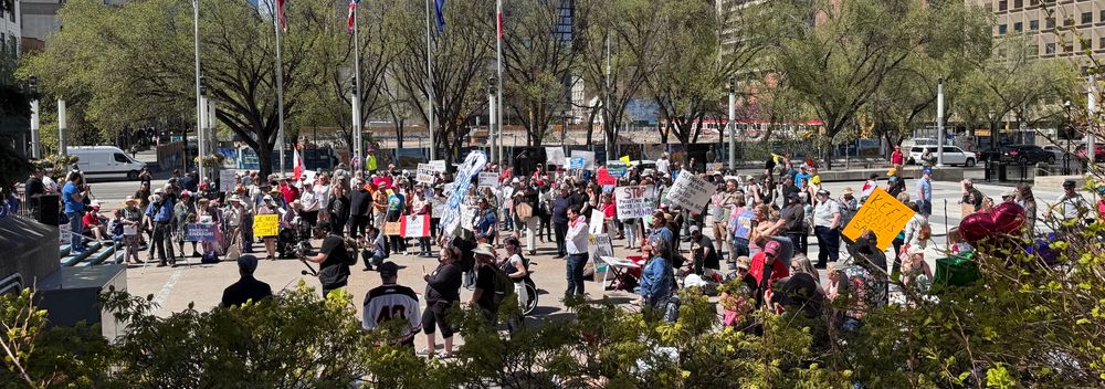 Calgarians protesting Danielle Smith’s separatist rhetoric. 