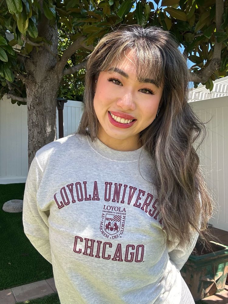 Michelle Liu in LUC merch