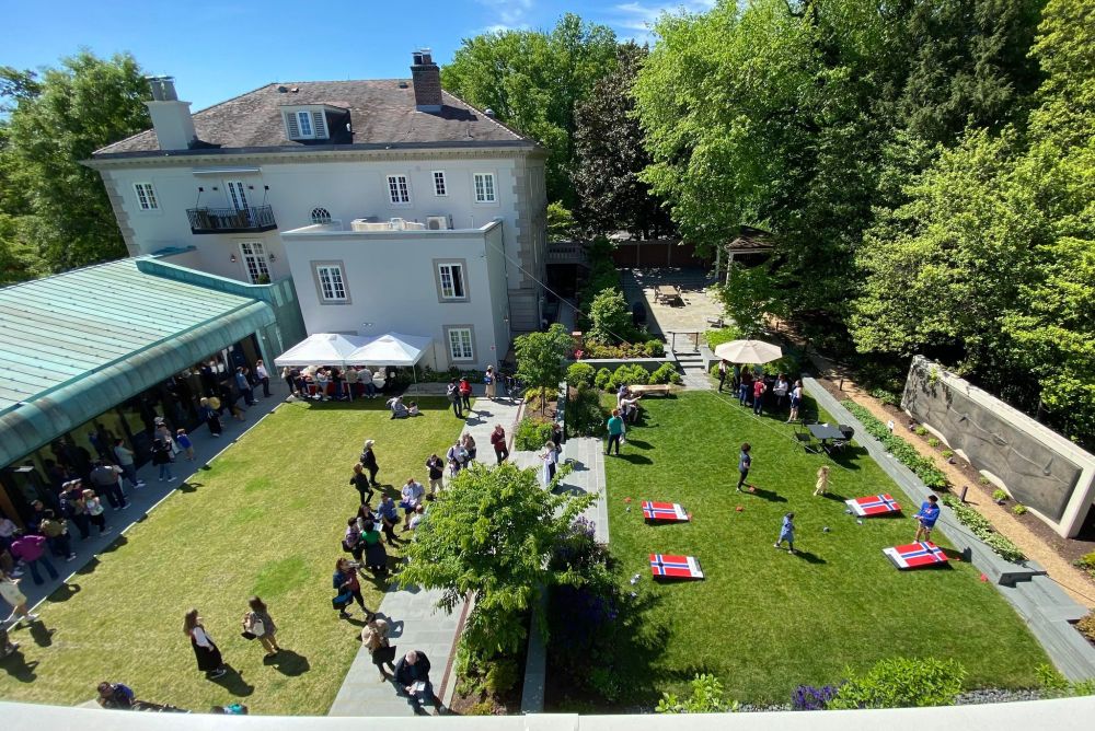 The Embassy garden as seen from above, complete with Norwegian-flag cornhole games.