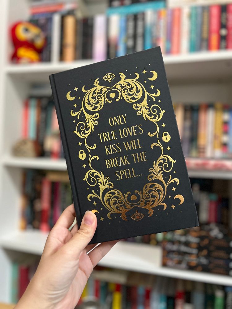 The naked hardcover for The Secret Romantic’s Book of Magic, edited by Marie O’Regan and Paul Kane. The golden text says “Only true love’s kiss will break the spell.”