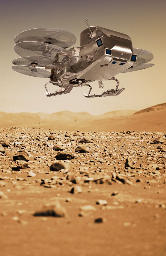 Artist’s Impression: Dragonfly on the Surface. Dragonfly prepares to sample and examine the surface of a landing site on Titan. (Image credit: NASA/Johns Hopkins APL/Steve Gribben)