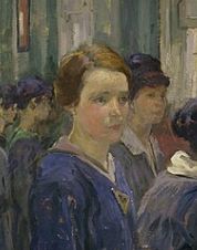 Woman staring off into the middle distance while in a a queue.