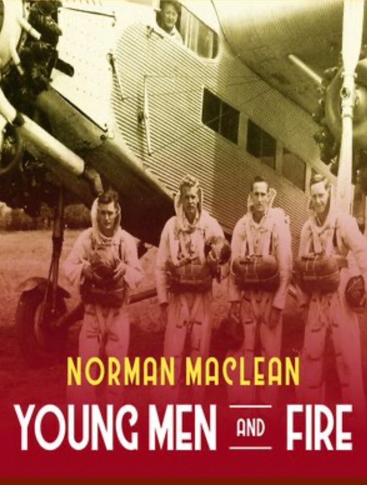 Cover of Young Men and Fire by Norman Maclean. The cover is a photo of smokejumpers circa 1949, the subject of the book, overlaid with a reddish color suggesting flames.