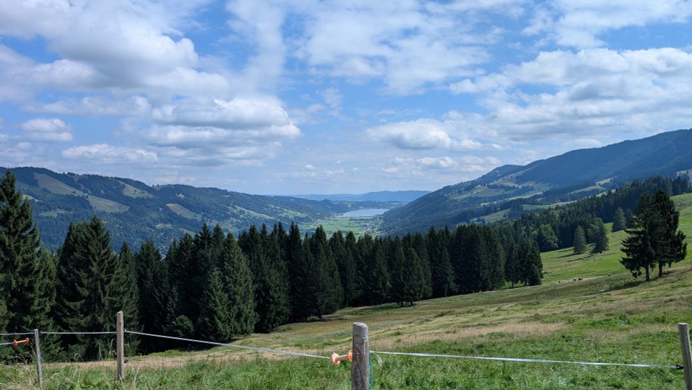 View over an alpine valley with low mountains