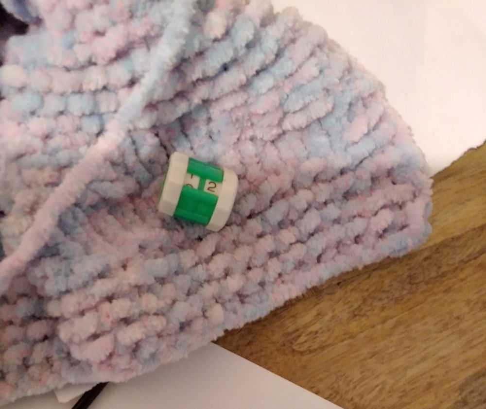 Plastic knitting stitch counter.