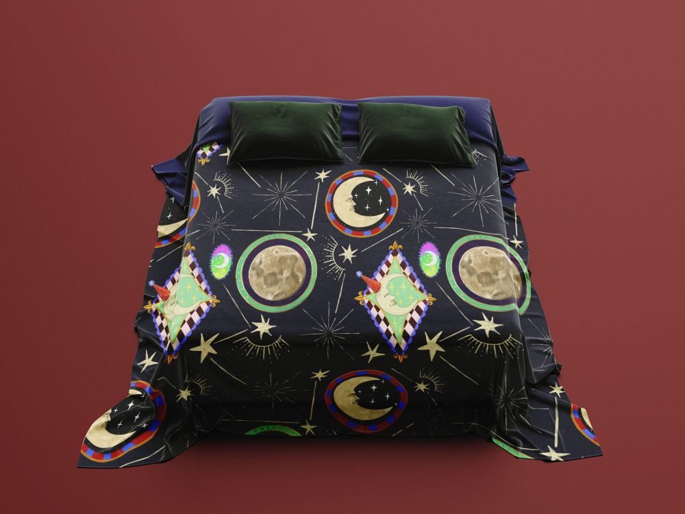 Mockup showing my moon pattern as a bedding design 