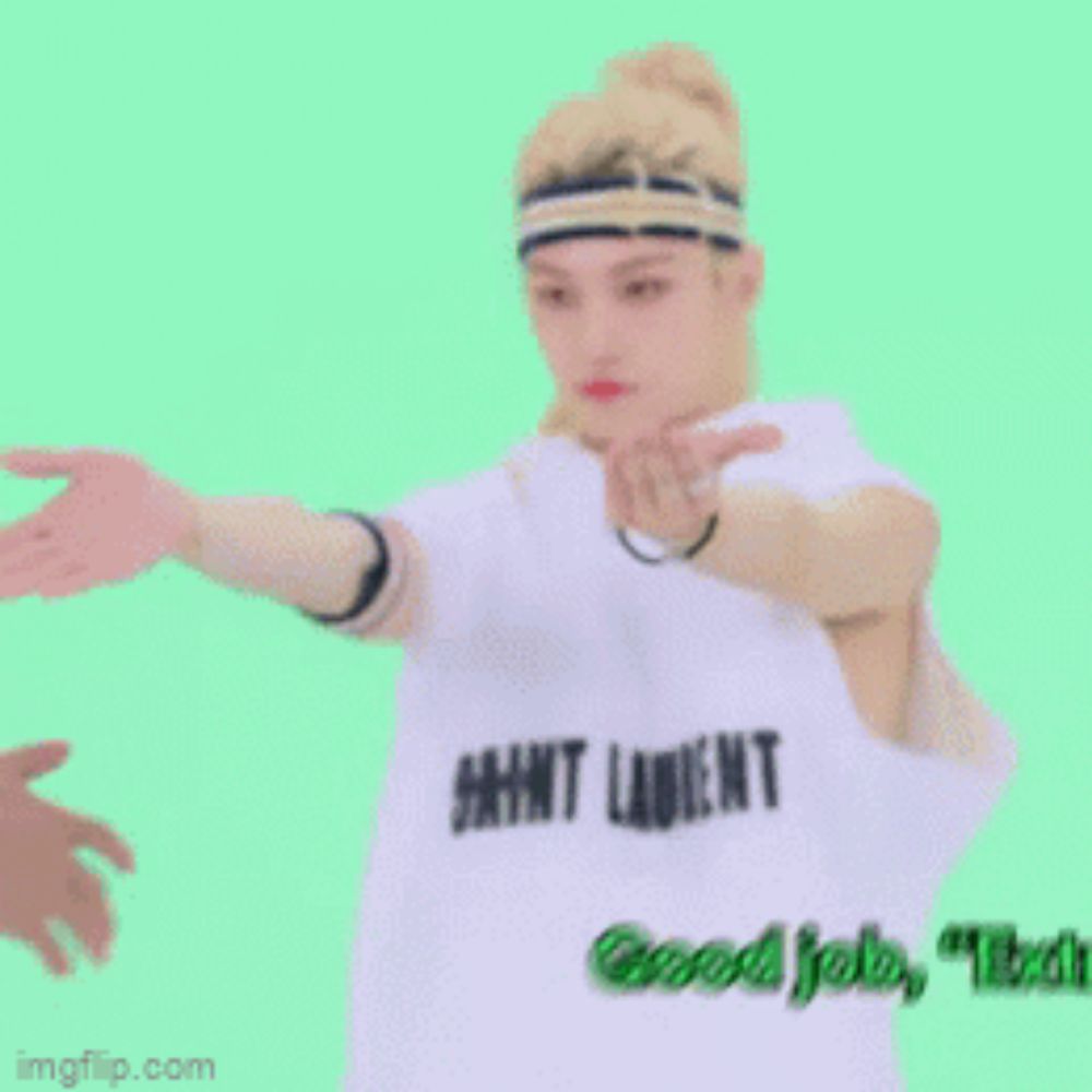 a woman wearing a headband and a white shirt that says good job