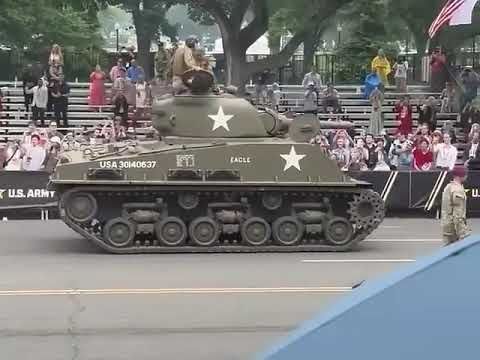 Squeaky Tank Before Empty Bleachers at the Trump Parade