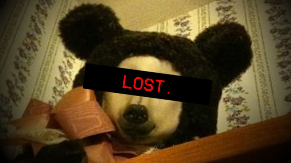 thumbnail for my video about the teddy creepypasta. the titular teddy has his eyes covered with a black rectangle, and red text reading "LOST" is written over the black box. video linked above.