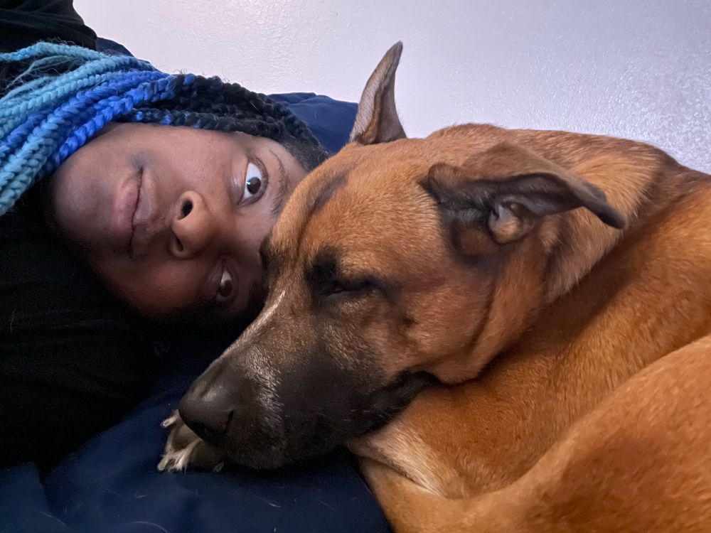 my dog Penny trying to sleep with her head on my head