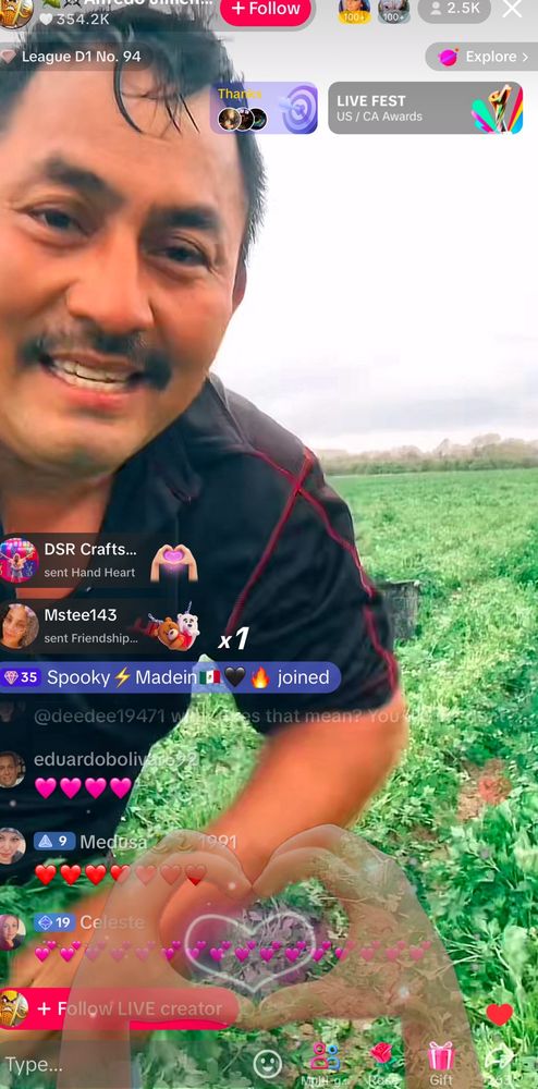 A screengrab of a tiktok live showing a Latino man picking cilantro
