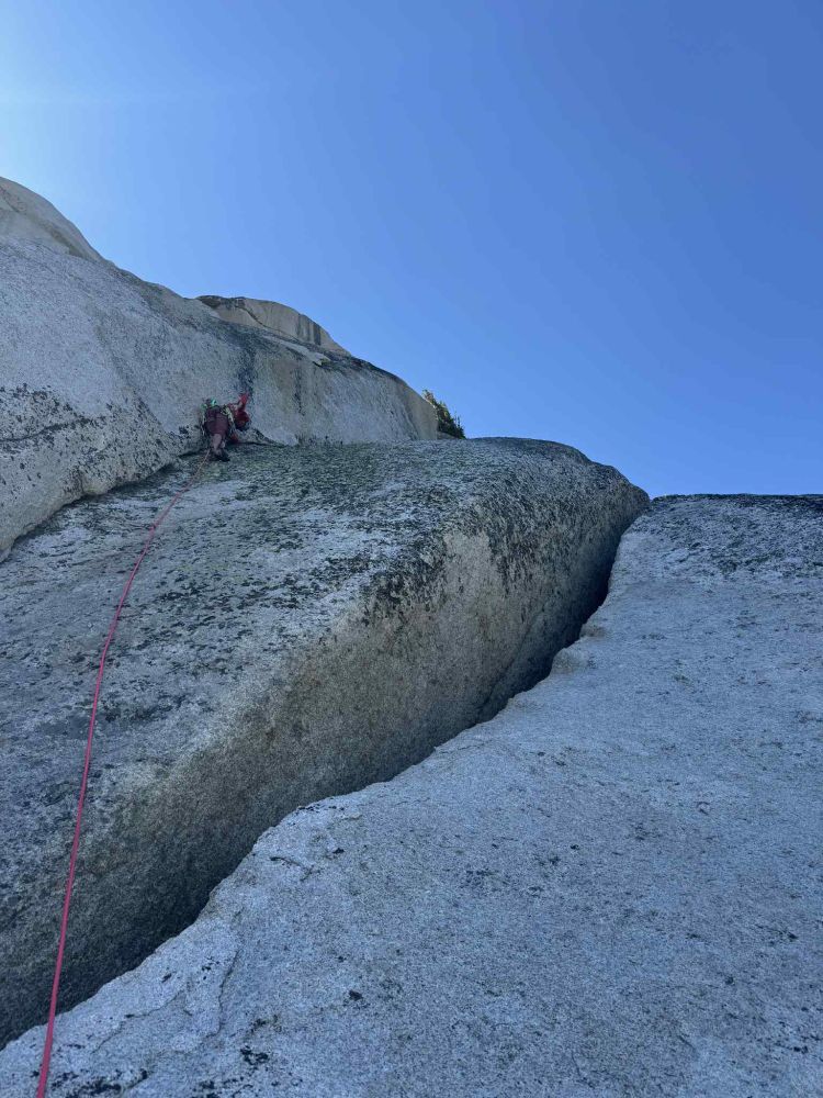 me leading up a crack on the North Buttress of Cathedral peak (the side no one ever climbs)