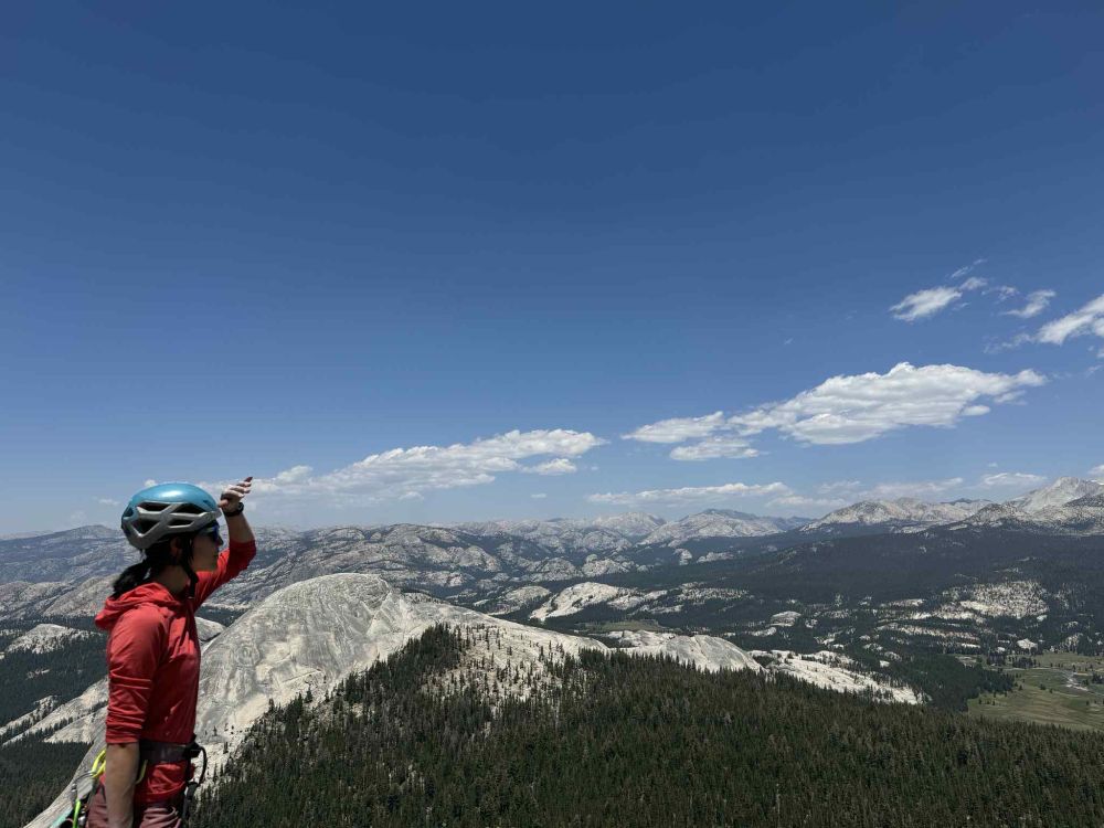 me on the summit looking across Tuolumne high country with the backside of Fairview Dome behind me and big blue sky