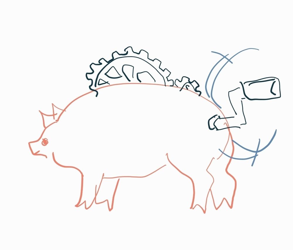 a hog being cranked. it has gears on its back