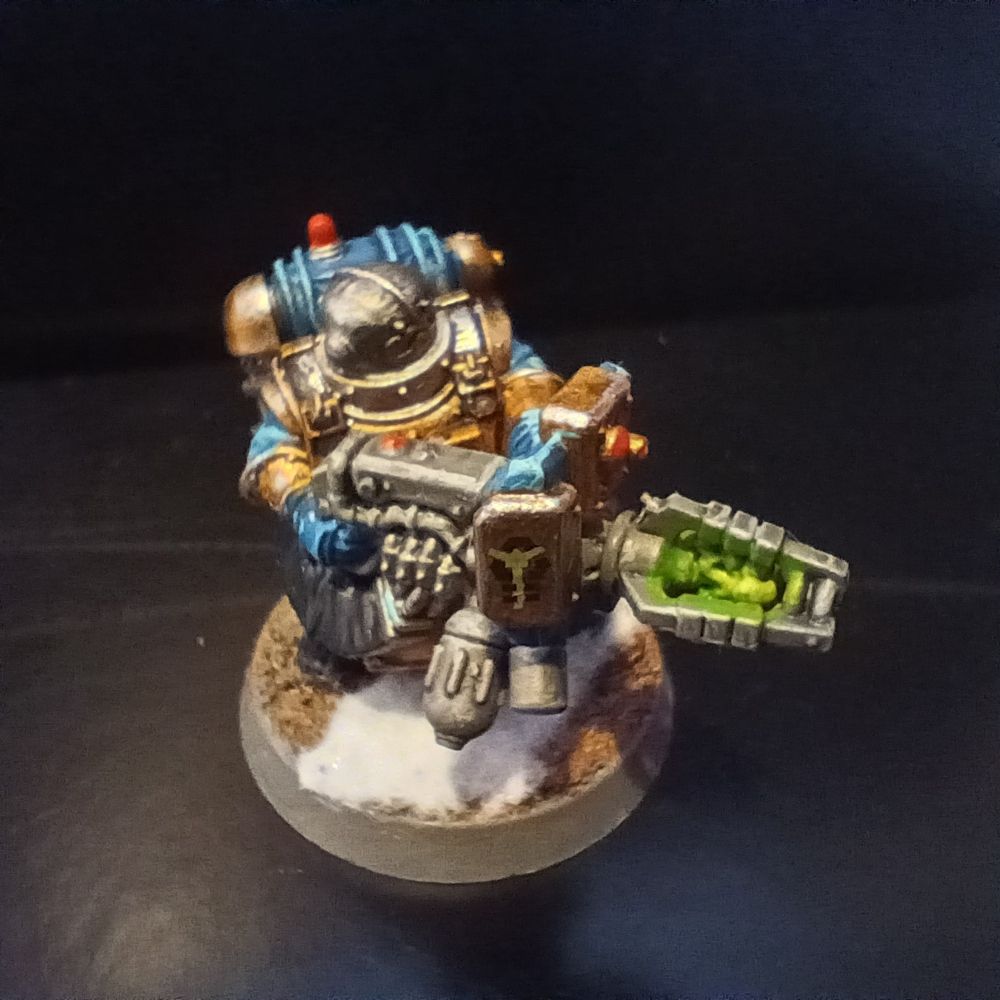 Votann Arkanyst Evaluator painted in copper and blue on a snowy red planet base.