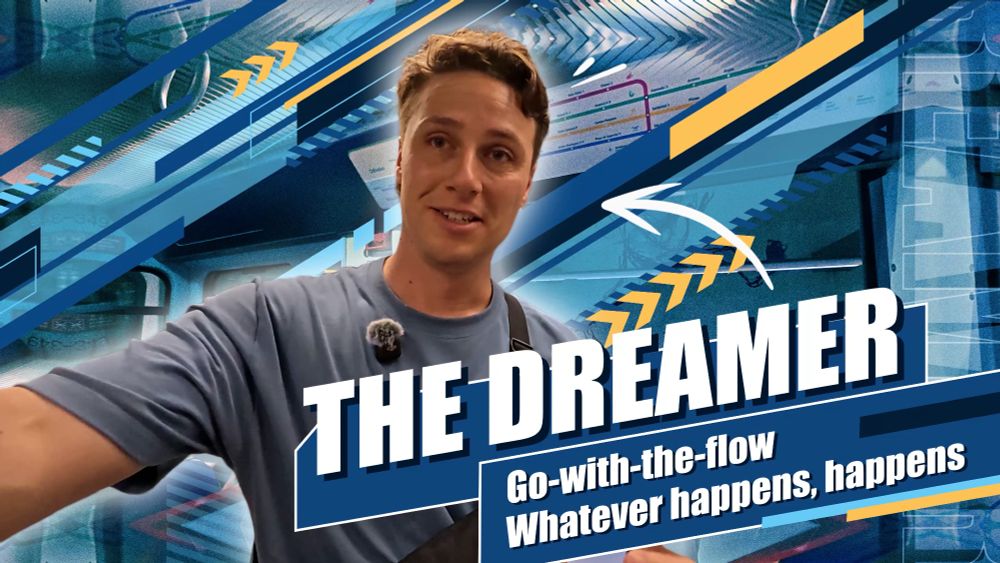 Michael Downie stands with a blue retro background with the text, "The Dreamer: go-with-the-flow, whatever happens, happens" next to him.