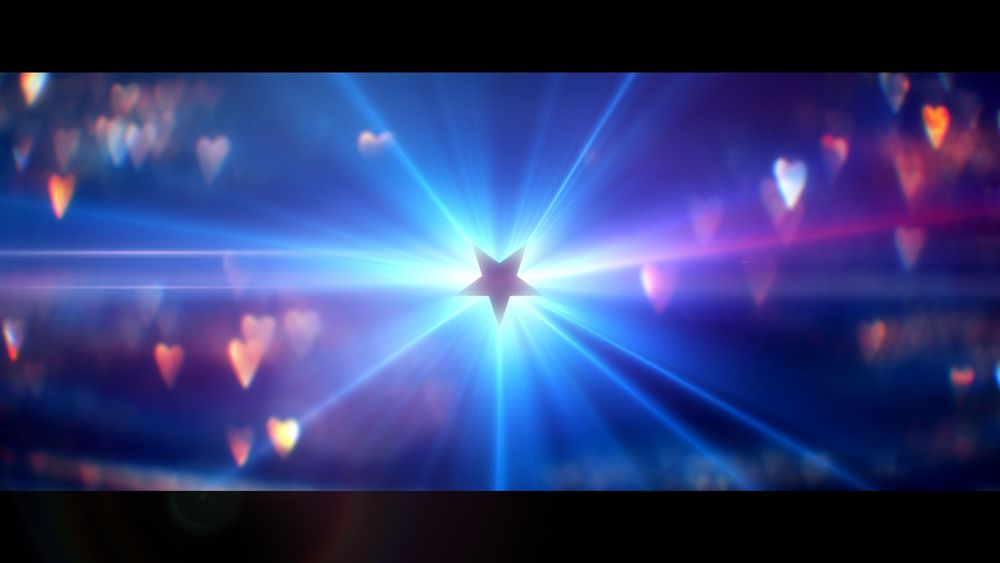 A purple Nebula logo, a star, is illuminated by light from the back amid a series of heart reflections.